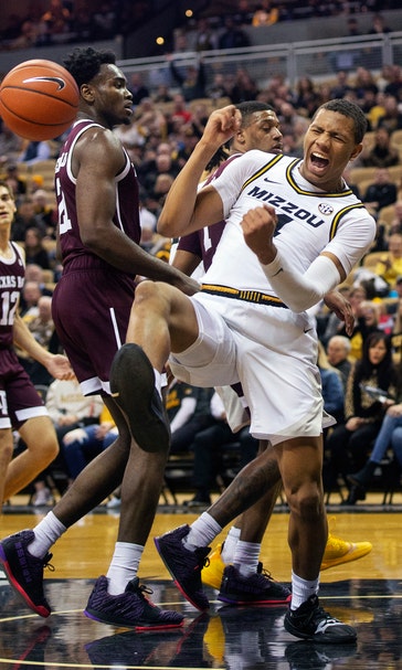 Texas A&M erases deficit, beats Missouri 68-59